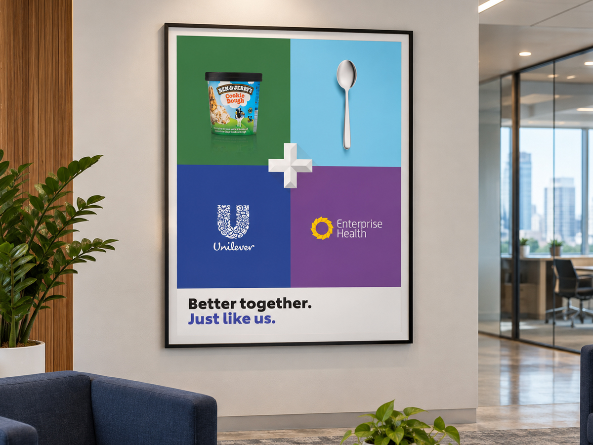 A framed poster pairing Ben & Jerry's ice cream and a spoon with the Unilever and Enterprise Health logos, reading Better together, just like us